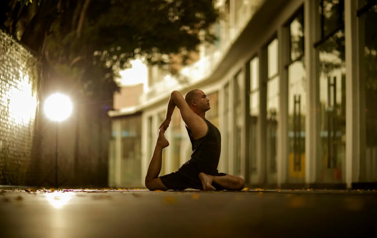 Man Stretching on the Street
